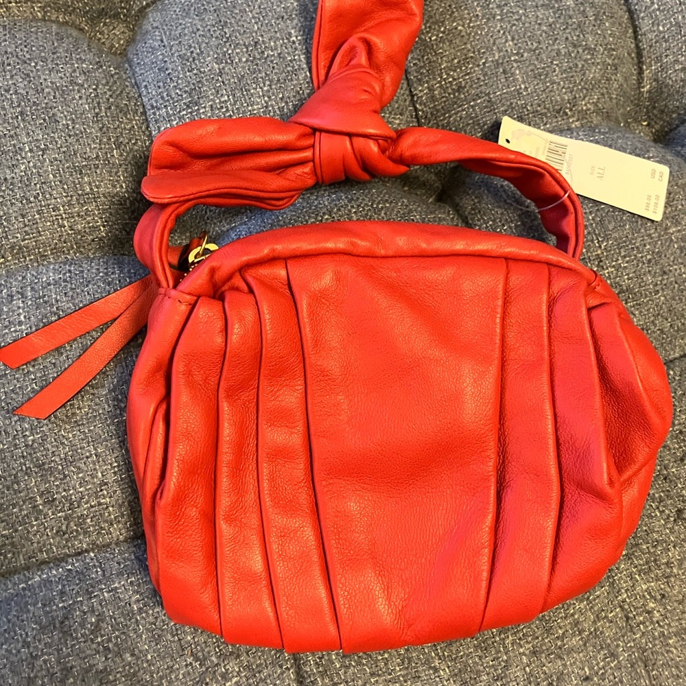 NWT Anthropologie red leather zipper purse with bow